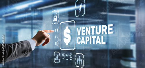 Venture capital. Investor capital. Businessman pressing virtual screen inscription