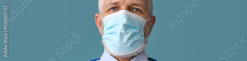 Mature male doctor in medic...