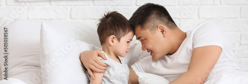Morning of Asian father and...