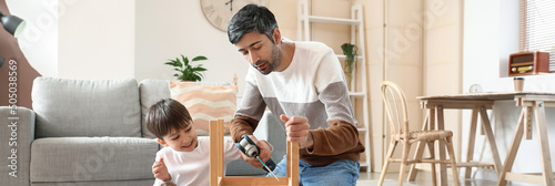 Father and little son fixin...