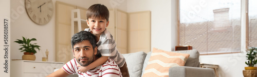 Portrait of happy father an...