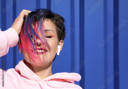 Beautiful woman with dyed h...