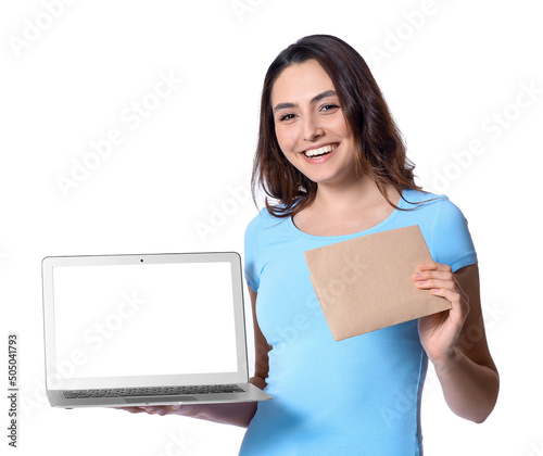 Smiling young woman holding...