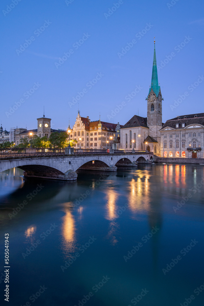 Münsterbrücke and Fraumünster church in Zurich (Zürich) at night, Switzerland