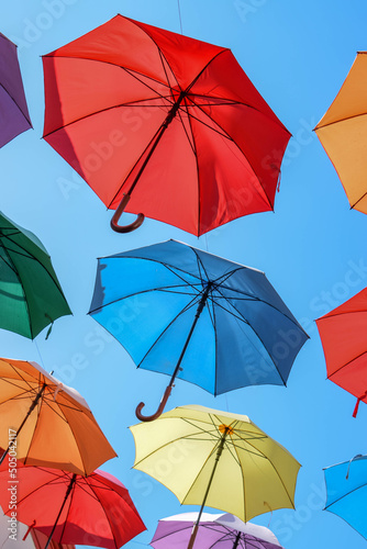 Colorful umbrellas in the sky