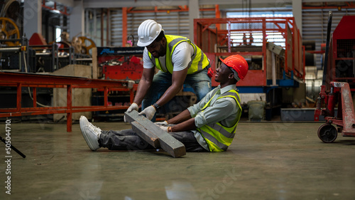 Fotografi Accident concept , The team worker was born in a factory Accident