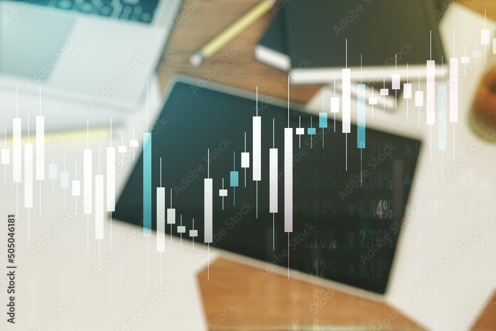 Double exposure of abstract creative financial diagram and modern digital tablet on background, banking and accounting concept Double exposure of abstract creative financial diagram and modern digital tablet on background, banking and accounting concept