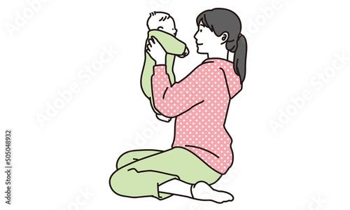 赤ちゃんをあやす女性	
