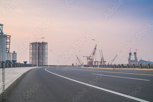 Yangtze River Bridge and asphalt road under construction in Suzhou  China