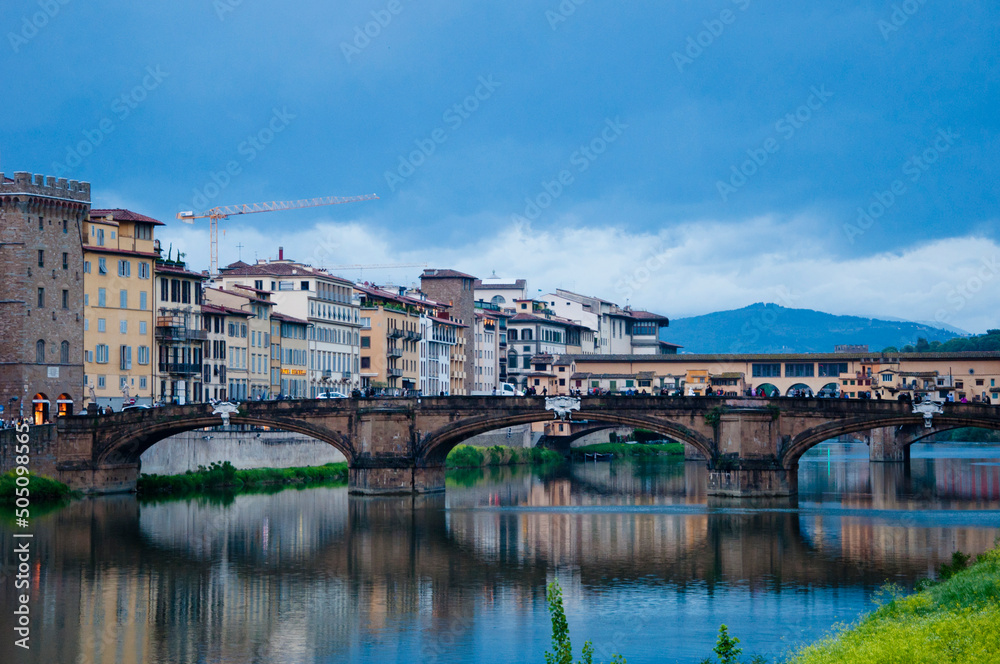 Ponte Santa Trinita arch bridge over river Arno in Florence, Italy