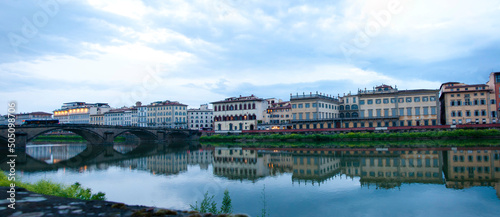 View at Ponte alla Carraia and Arno river embankment in Florence, Italy photo