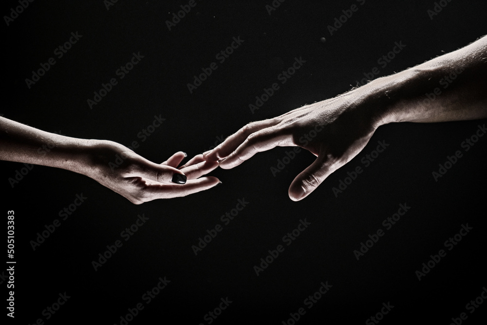 Hands at the time of rescue. Friendly handshake, friends greeting, teamwork, friendship. Rescue, helping gesture or hands. Romantic touch with fingers, love.