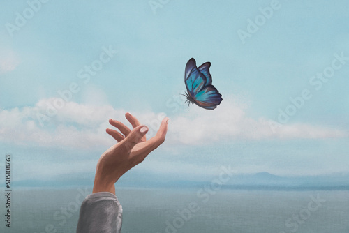 colorful butterfly is laying on a woman's hand