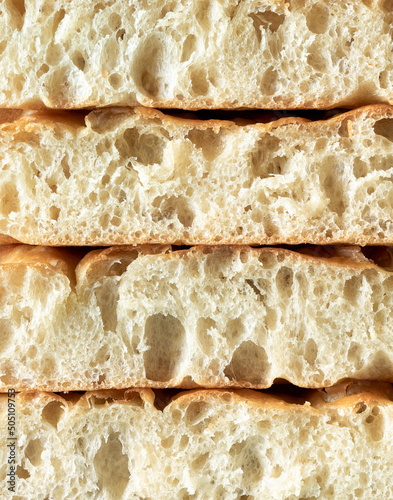 фотографія Focaccia slices close up. Sourdough bread interior