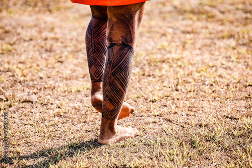 Painted leg of indian man from the Asurini indigenous tribe, Xingu River, Baixo Amazonas, Amazon, Brazil.