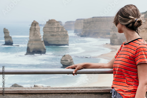 Lady looks towards tourist view at Port Campbell. photo