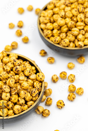Roasted chickpeas on a white background. Close-up. local name leblebi