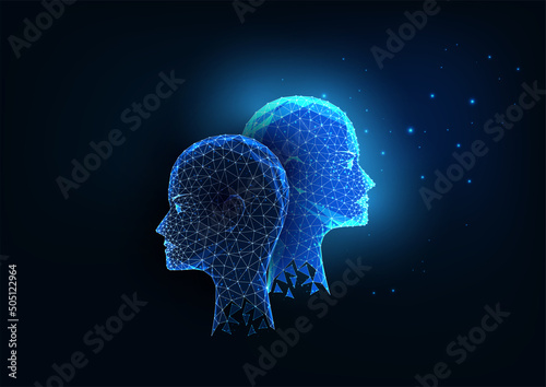 Futuristic bipolar disorder concept with glowing low polygonal light and dark human heads photo