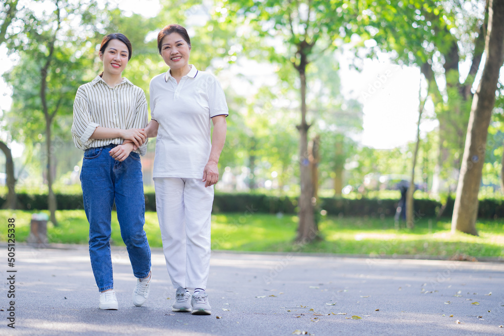 Portrait of Asian mother and daughter at park Portrait of Asian mother and daughter at park