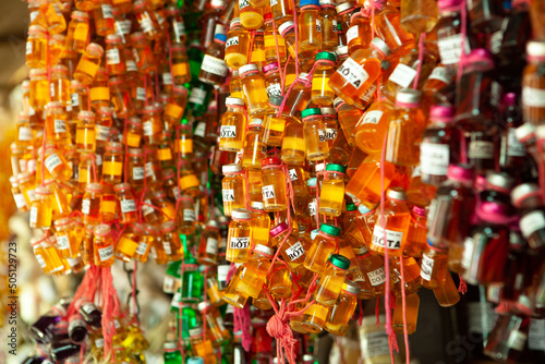Bottles of Cheiro do Pará on display at Ver-o-Peso market in Belém do Pará, Amazon, Brazil.