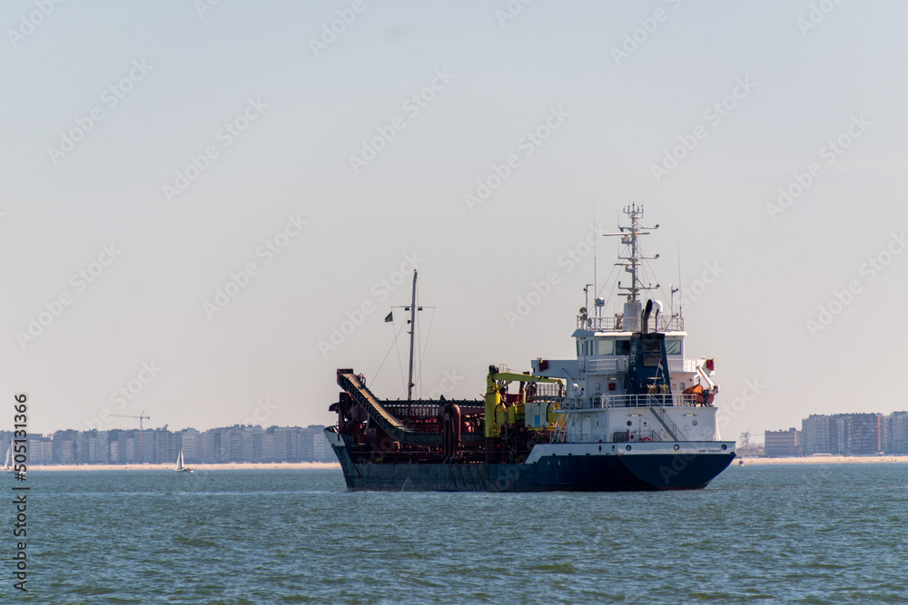 Dredging ship near the port of Ostend Dredging ship near the port of Ostend
