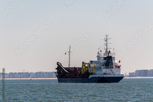 Dredging ship near the port of Ostend