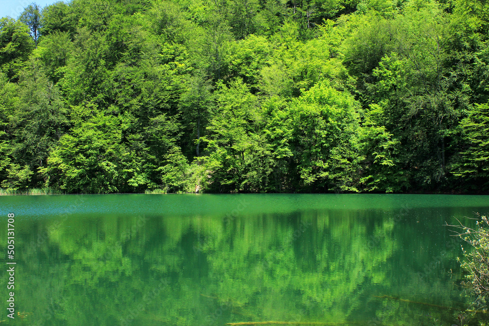 Beautiful blue lake high in the mountains. Ambil. Beautiful blue lake high in the mountains. Ambil.