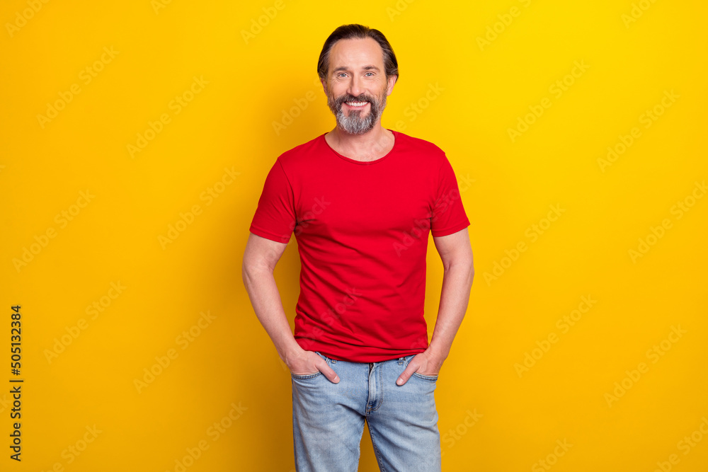 Photo of cool young brunet man wear trend cloth isolated on yellow color background Photo of cool young brunet man wear trend cloth isolated on yellow color background