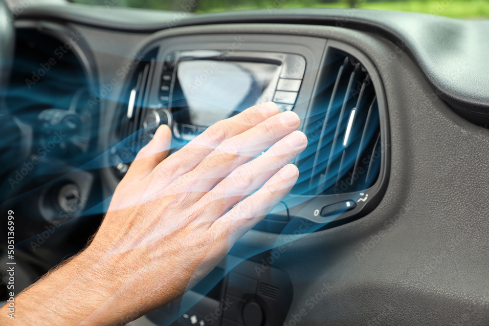 Man checking work of conditioner in car and illustration of cool air flow, closeup