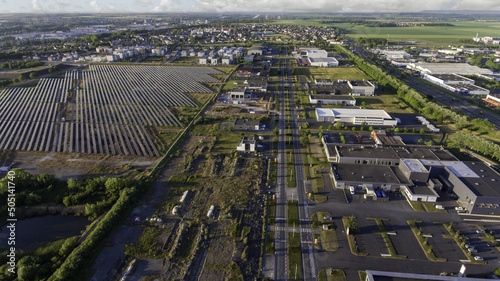 Colombelles industrial zone top view, solar panel farm in the distance, symbol of transformation, green enargia, top view drone photo