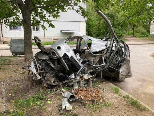 A damaged car in Kharkov as a result of shelling of a peaceful city by Russian troops.