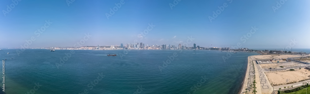Aerial panoramic view at the Luanda Bay and Luanda city downtown, Modern skyscrapers buildings, bay, Port of Luanda, marginal and central buildings, bay water, Angola