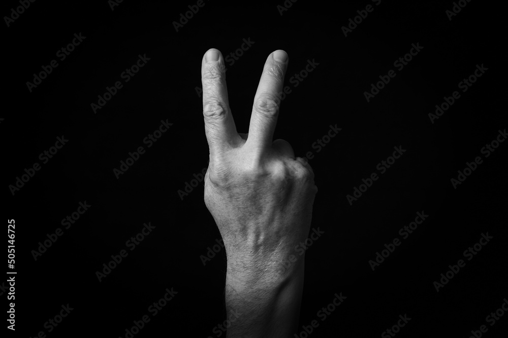 Reverse Victory Hand emoji isolated on black background Reverse Victory Hand emoji isolated on black background