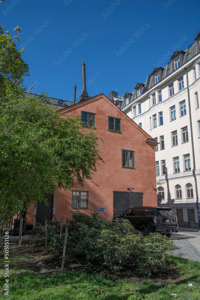 Fototapeta premium Façade of an old 1700s building on the island Blasieholmen a sunny day in Stockholm