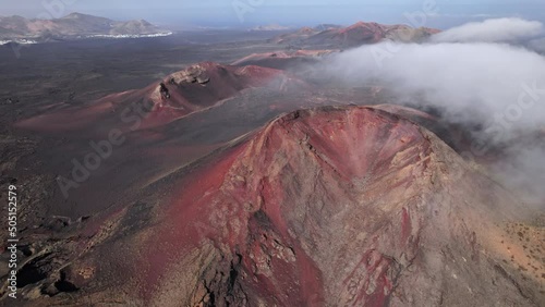 Flying over volcanoes near Timanfaya National Park, Lanzarote, Canary islands photo