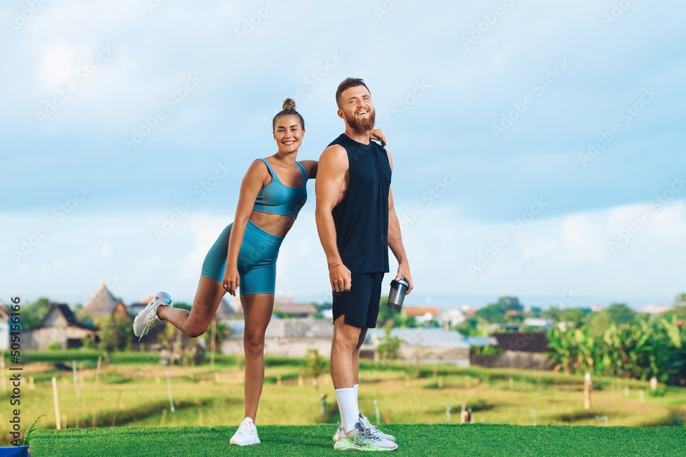 Athletic european couple have fun before training..