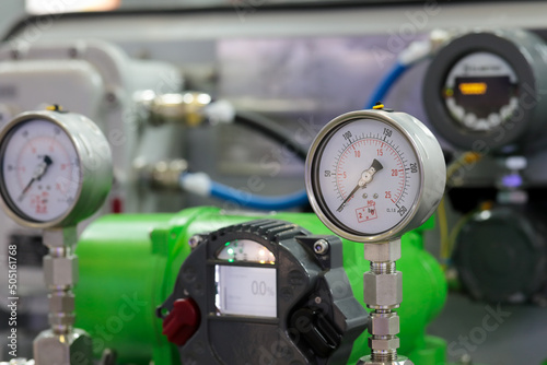 analog pressure gauges and digital flowmeters photo