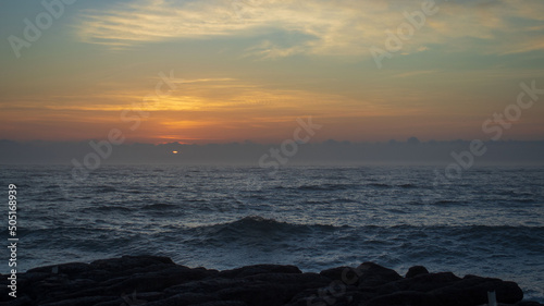 A early morning sunrise seen over the ocean on the south coast of South Africa