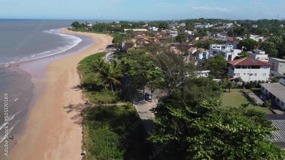 Beautiful seaside city of Brazil with dark areas and sunrise on the atlantic ocean - Bicanga, Espirito Santo - aerial drone view Beautiful seaside city of Brazil with dark areas and sunrise on the atlantic ocean - Bicanga, Espirito Santo - aerial drone view