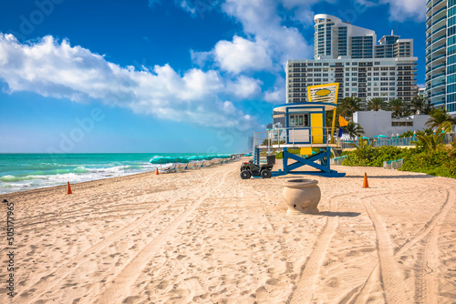 Turquoise sand ocean beach and waterfront in Hollywood, Florida view © xbrchx