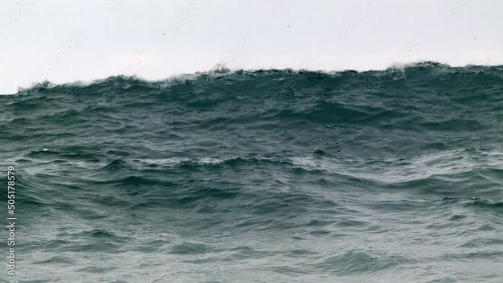 Close Up Curling Waves Crashing on the Beach.
