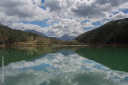 A series of reflections on the Drina River with reflection. Symmetry and harmony.