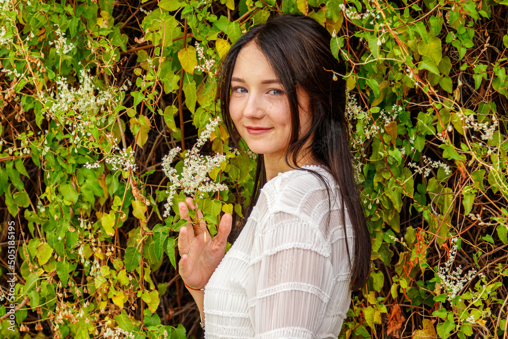 beautiful girl in a white dress in the par beautiful girl in a white dress in the par