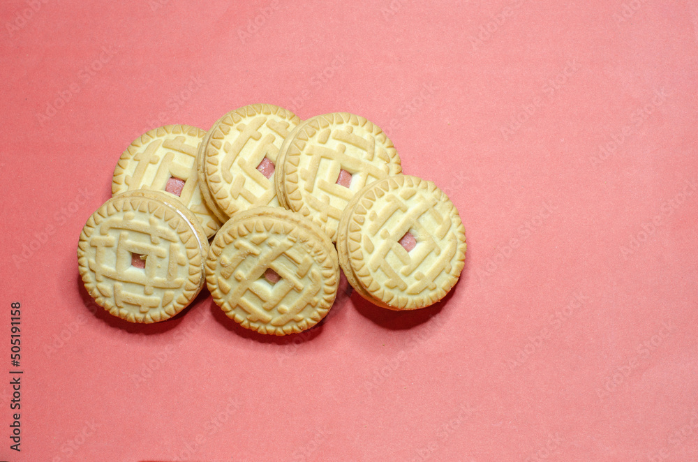 Cookies with filling on a pink background Cookies with filling on a pink background