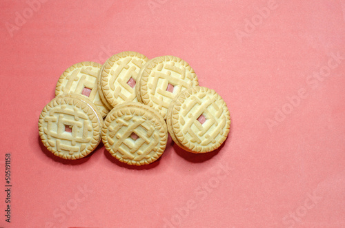 Cookies with filling on a pink background