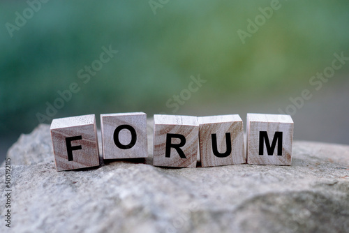 Forum word on wooden cube