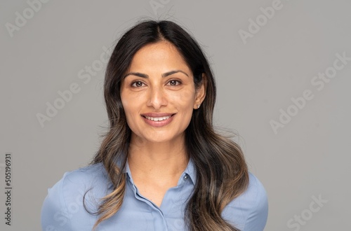 Tableau sur toile Studio headshot of beautiful Asian Indian woman in blue blouse.