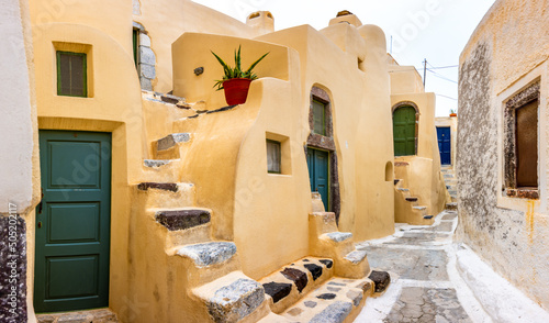 Narrow neighborhood at the old traditional village of Emporio, Santorini, Greece.