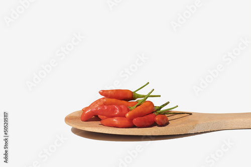 Red chili peppers or siling labuyo on a wooden tray