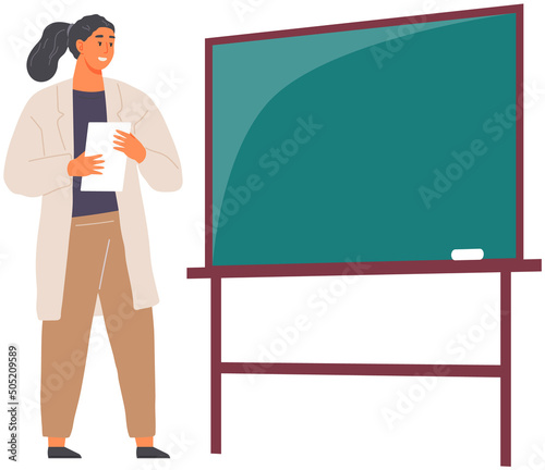 Woman in lab coat stands near blackboard. Teacher conducts chemistry lesson for students. Science, education, study of chemistry at school or university concept. Scientist talks about science in class